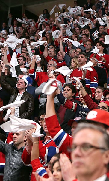Canadiens fans shower two Bruins with garbage